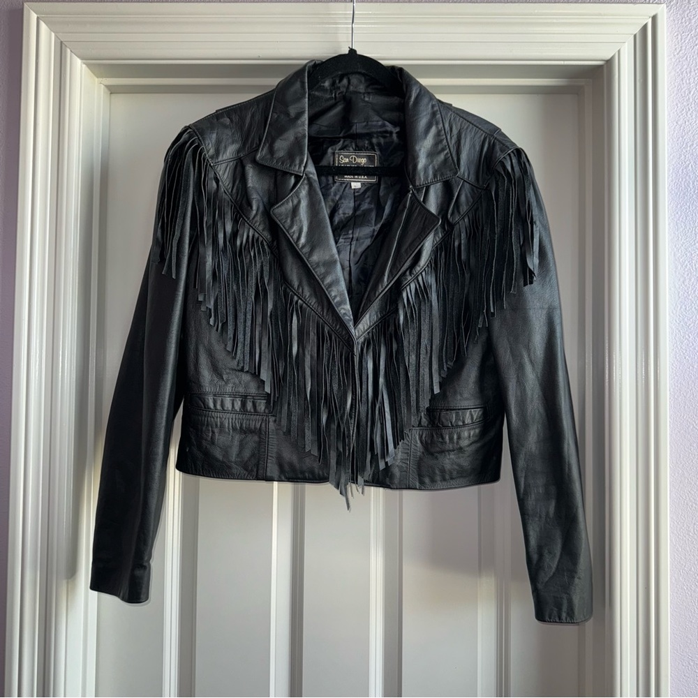 Cropped fringe leather jacket